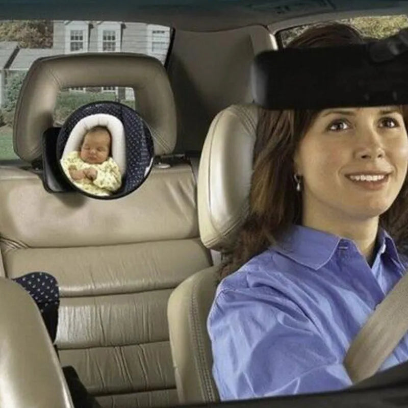 Black baby safety seat rearview mirror with 17cm diameter mounted on car headrest