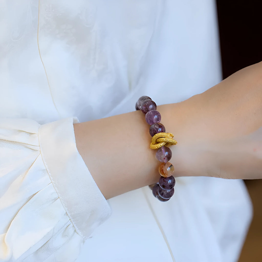 Purple cornucopia crystal bracelet with animal zodiac modelling in retro style