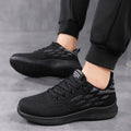 Men's lightweight mesh and PVC casual sports shoes in black, breathable for everyday wear