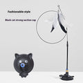 Cat teaser toy with suction cup base and long brush handle showing seven colourful attachments including cat faces and feathers
