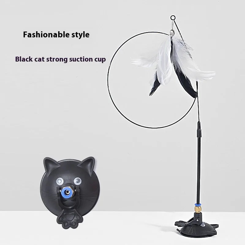 Cat teaser toy with suction cup base and long brush handle showing seven colourful attachments including cat faces and feathers