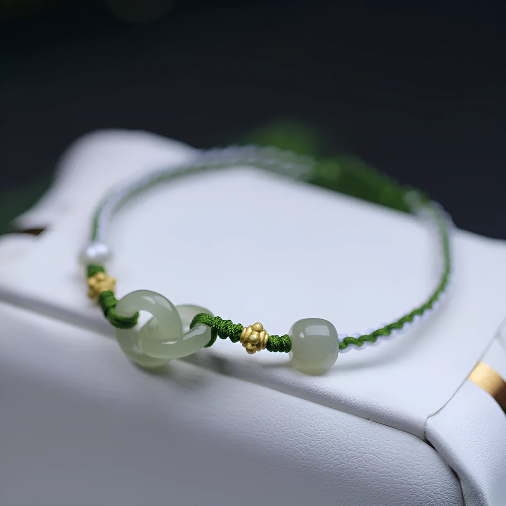 Natural Hetian jade woven bracelet with hollow-out design on flexible wire with silver or gold-plated elements