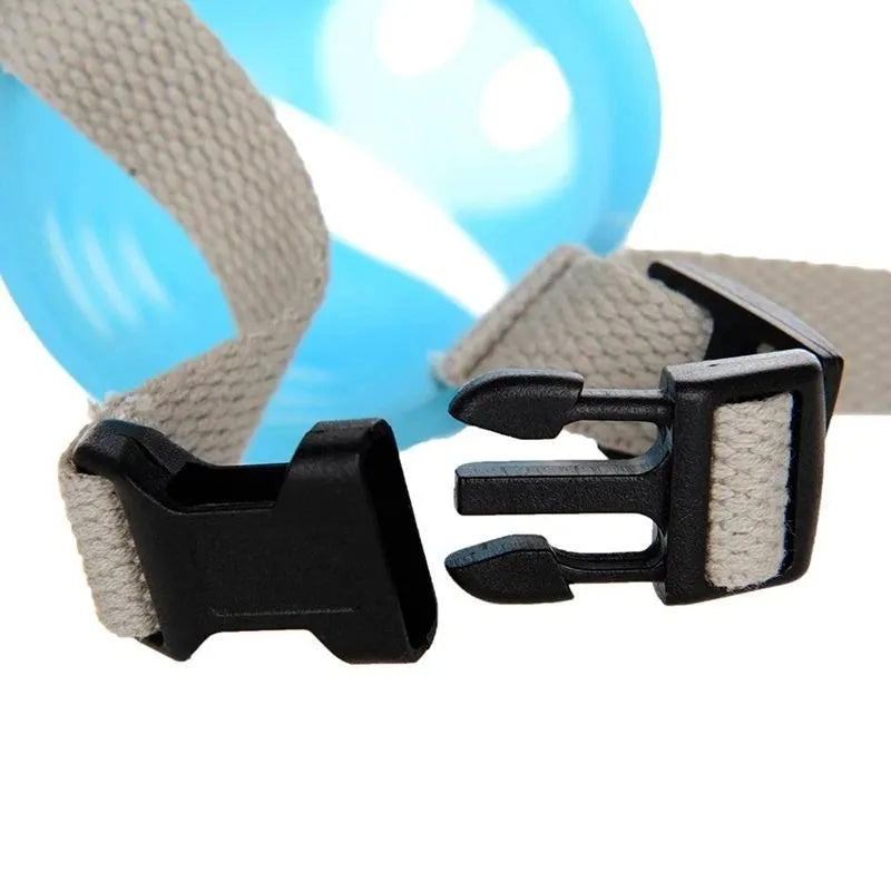 Blue and green silicone dog anti-bite mouth covers shown in large and small sizes.