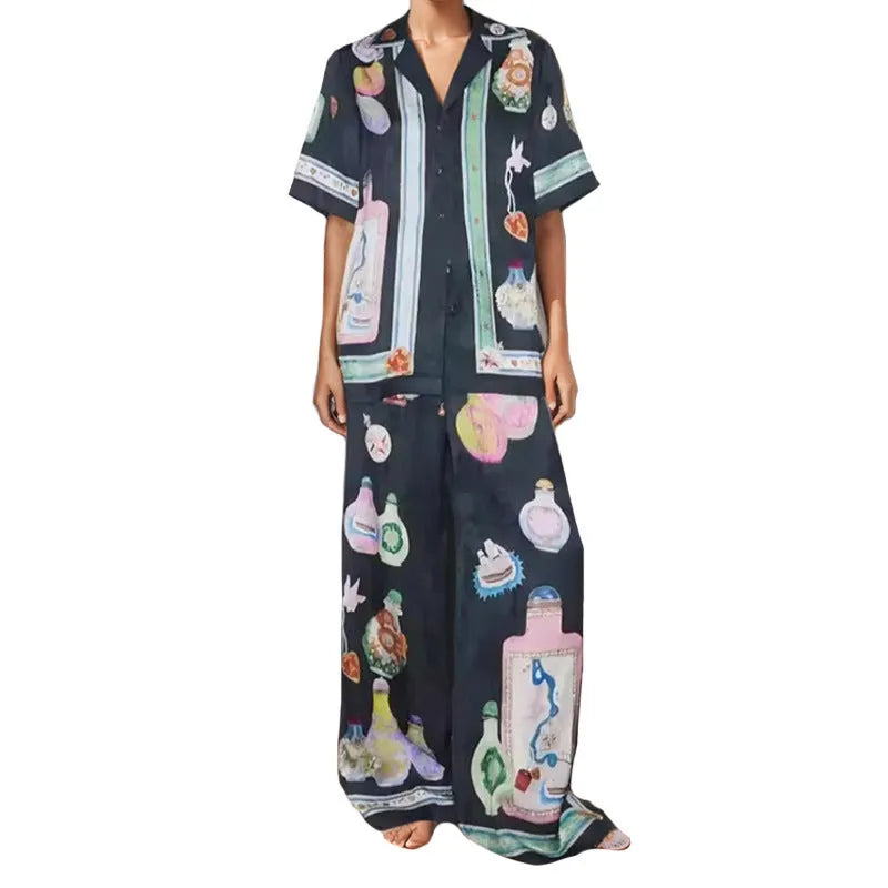 Black women's casual set with cartoon print, featuring a sleeve cardigan and trousers