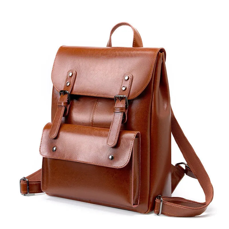 Women's leather computer backpack in black, brown, or coffee made from two-layer cowhide.
