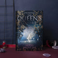Blue A5 hardcover notebook with luminous fluorescent cover, open to show full-colour illustrated pages.