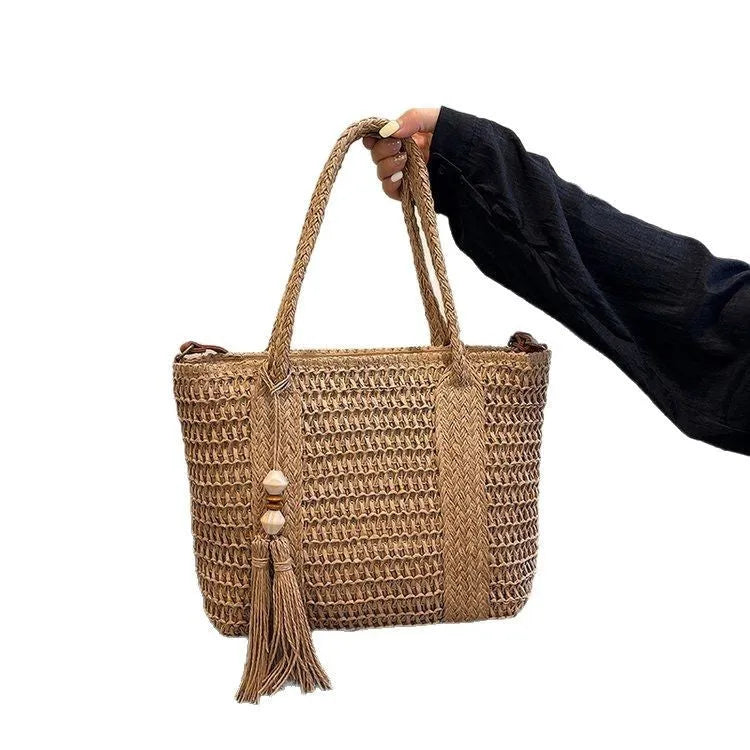 Women's soft straw crossbody bag with diagonal grass weave in milky white or khaki colour