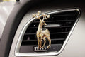 Cartoon-style alloy car air vent fragrance clip in a choice of decorative designs