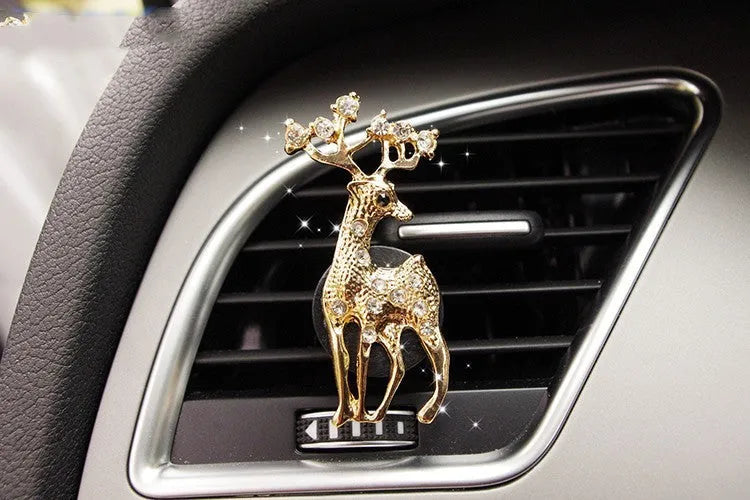 Cartoon-style alloy car air vent fragrance clip in a choice of decorative designs