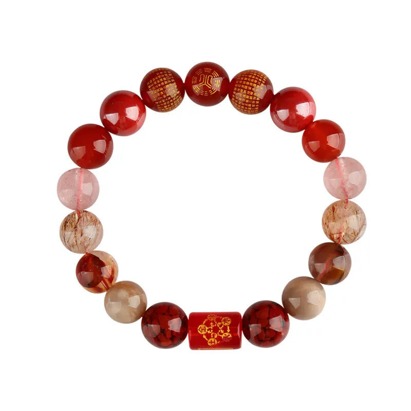 Handmade five elements crystal bracelet in gold, wood, water, fire, soil colours on a wrist.