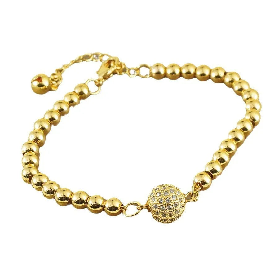 Arabic style women's copper bracelet with heart-shaped pendant featuring single zircon stone