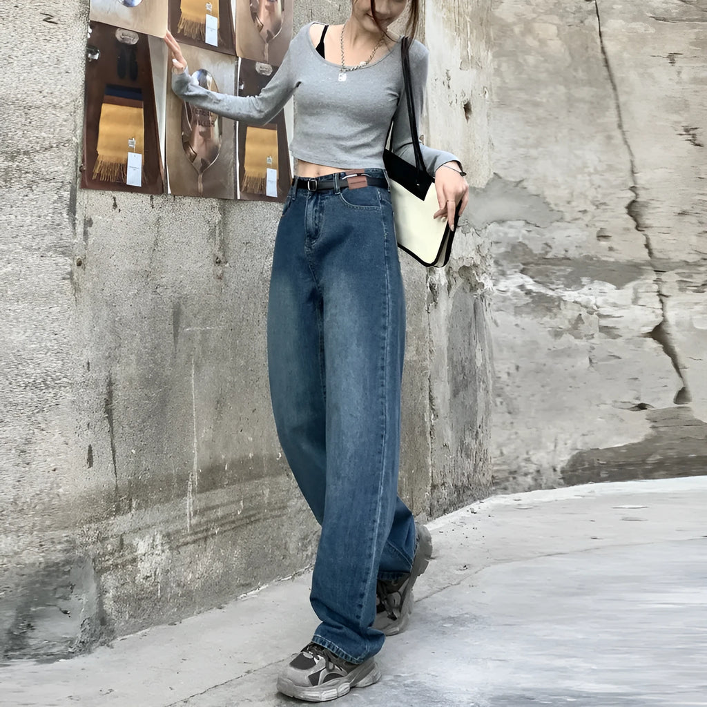 Women's high-waisted retro blue straight-leg jeans on a neutral background