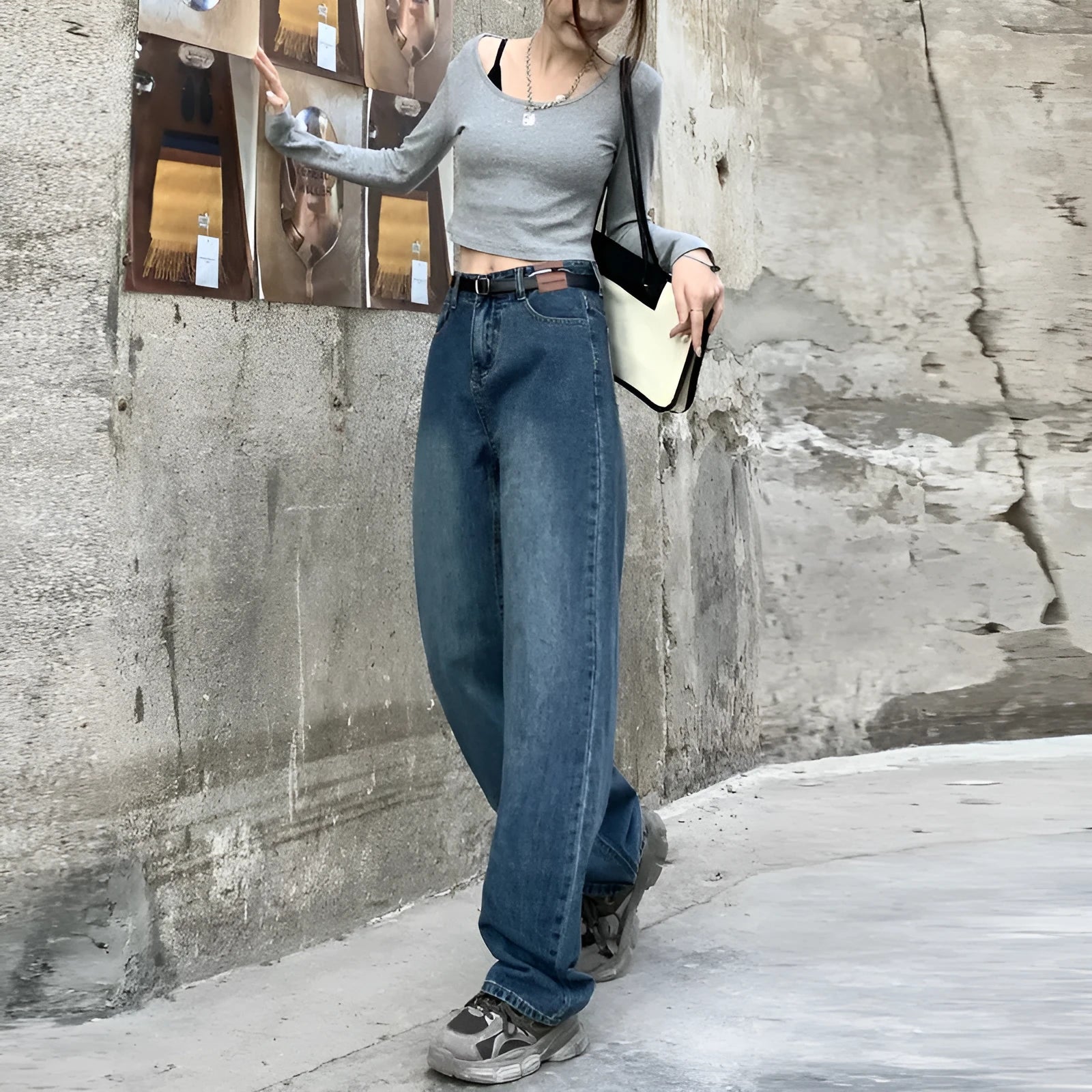 Women's high-waisted retro blue straight-leg jeans on a neutral background