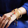 Brazil natural citrine bracelet with 1mm yellow beads on filament string