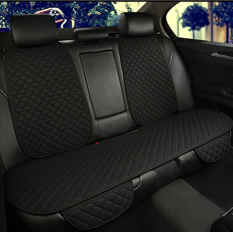 A linen universal car seat cushion shown in a classic black colour variant.