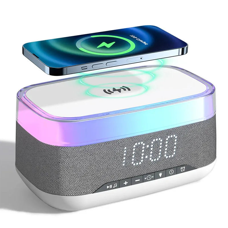 White multifunctional alarm clock unit with Bluetooth speaker and wireless charging pad.