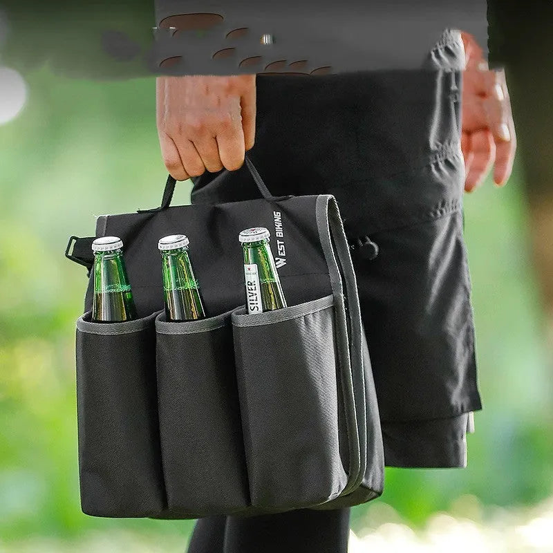 Black and orange double-sided bicycle drink storage bag mounted on a bike frame.