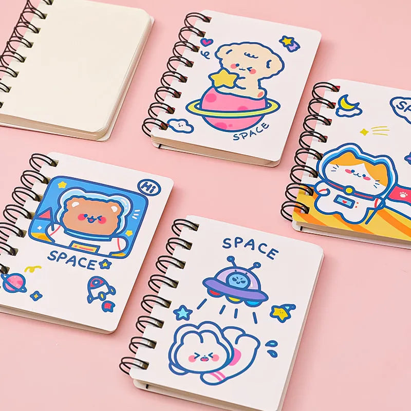 Astronaut series pocket notebook in 10.5cm by 8cm size, showing cover options: Astronaut Bear, Planet Teddy, Space Cat, UFO.