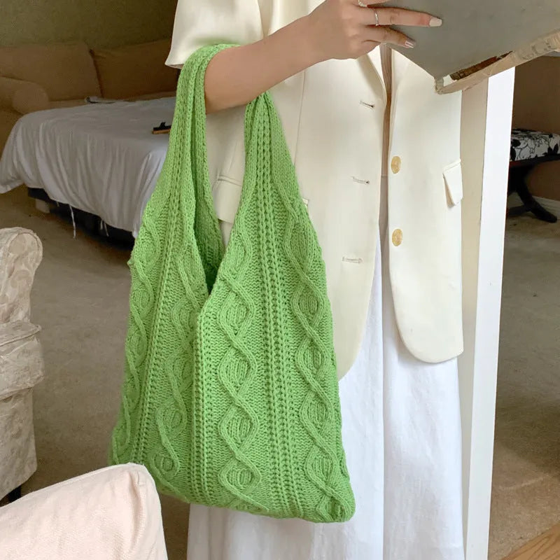 Knitted yarn shoulder tote bag in solid colour with hollow texture and double straps