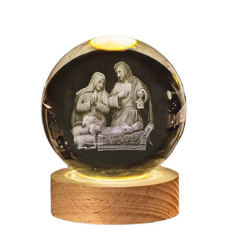 6cm white crystal ball ornament with engraved cross on a solid wood warm light base.