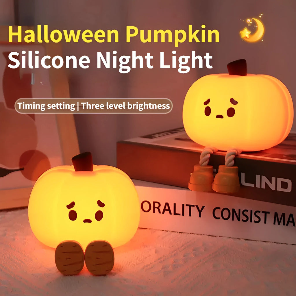 Orange pumpkin-shaped silicone night light with soft glowing illumination