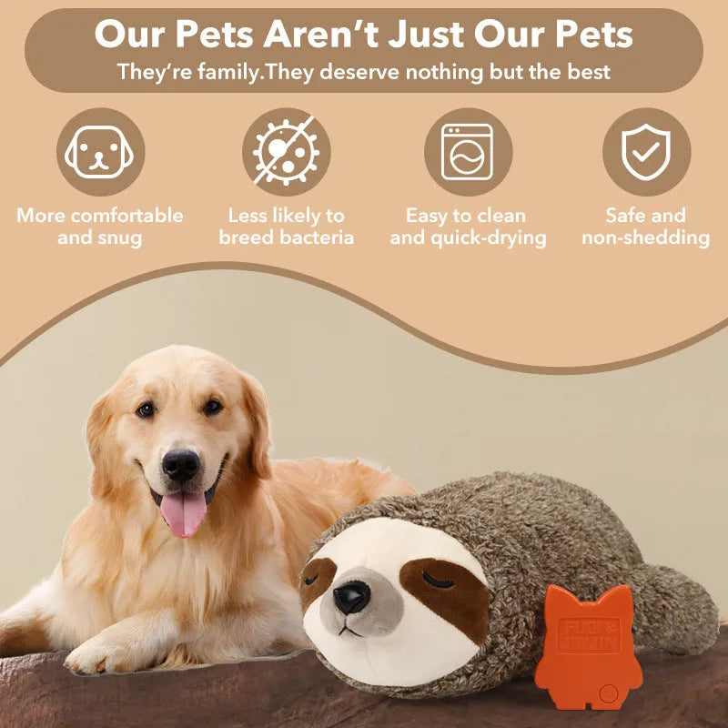 Sloth-coloured pet soothing plush toy with heartbeat device on soft surface