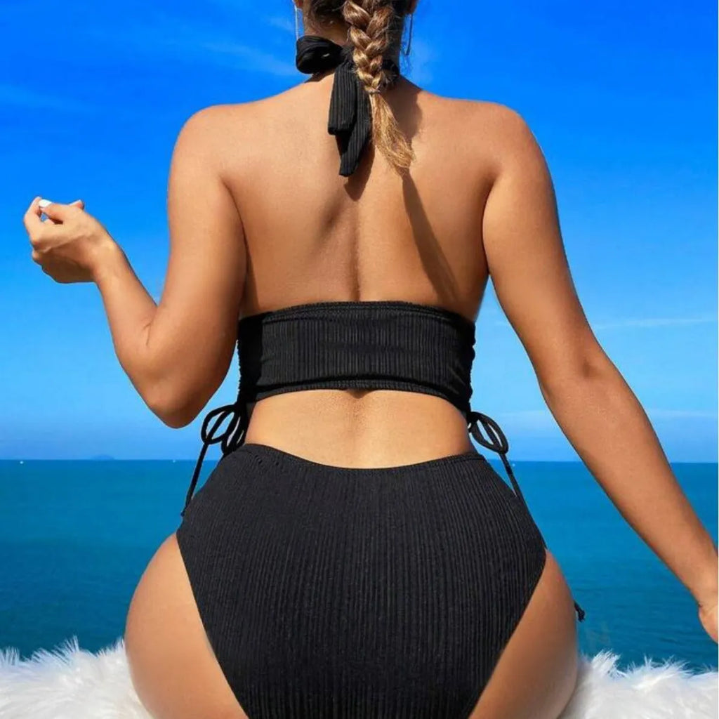 Black women's halter bikini with lace-up front detail and matching briefs.