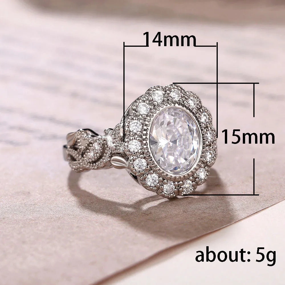Women's geometric ring with round zircon centre stone and white gold colour plating