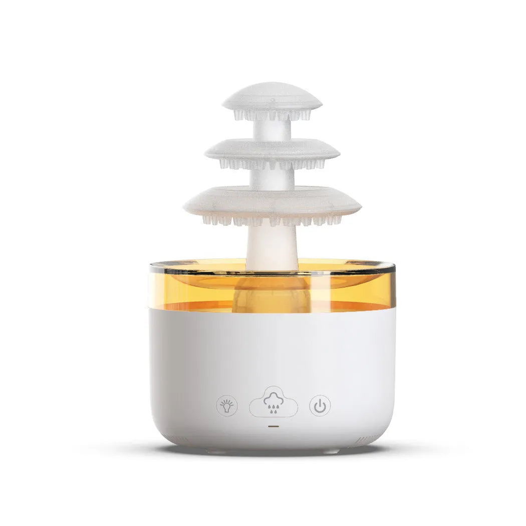 White cloud rain humidifier and essential oil diffuser with LED mood lighting on table