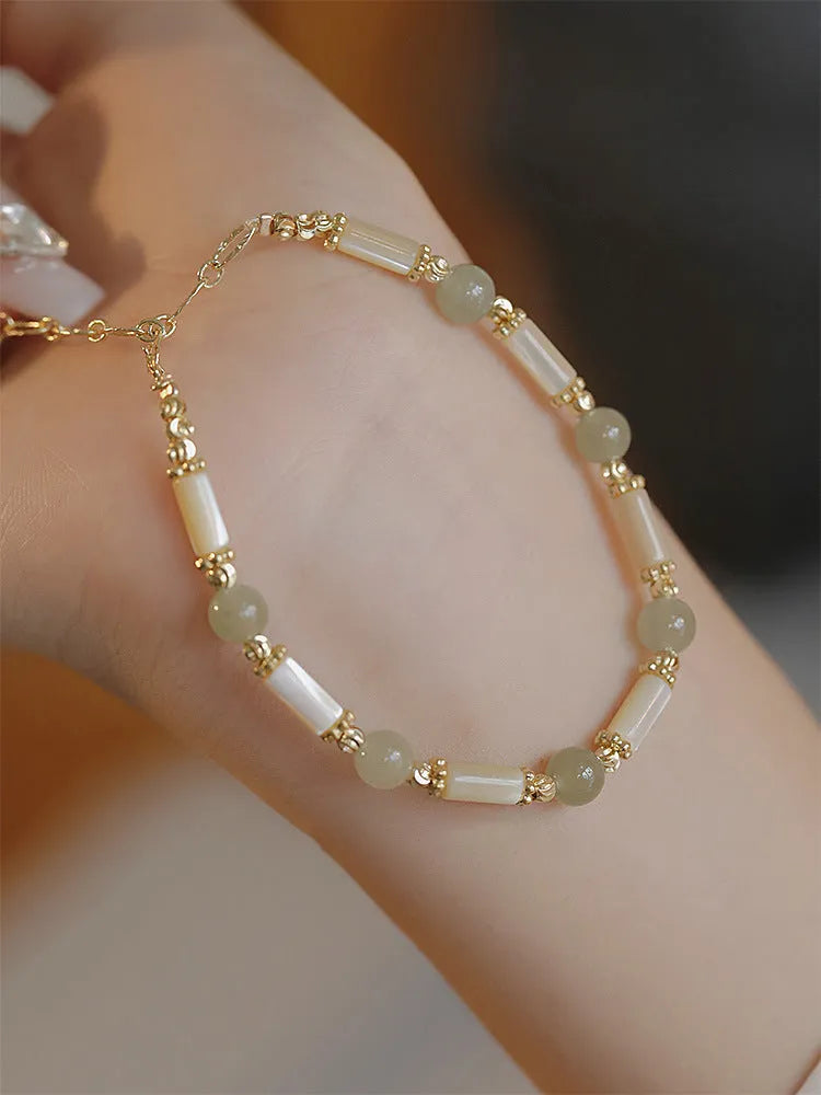 Hetian jade bamboo joint bracelet for women in 6mm size, shown in jade green and South red colour options.