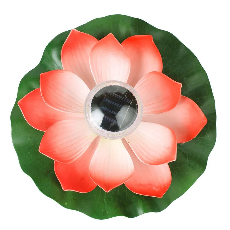Floating solar lotus lamp on pond water with colourful LED light