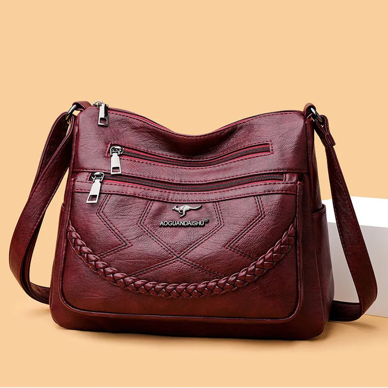 Soft PU leather women's shoulder bag in blue colour with crossbody strap