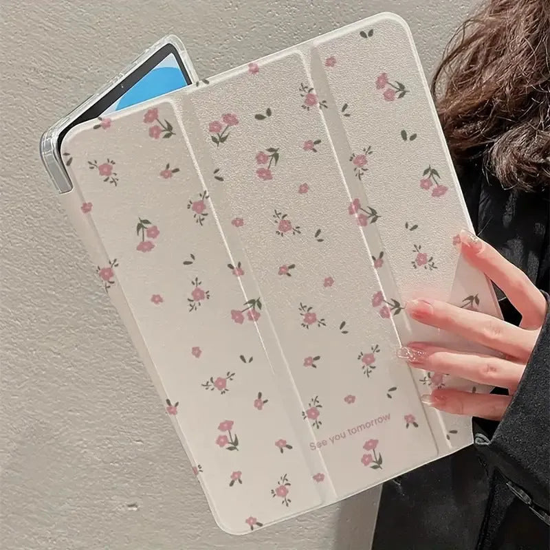 Transparent floral tri-fold iPad case showing magnetic stand function and clear polycarbonate construction