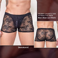 Men's black lace boxer shorts made from nylon fabric, laid flat to show front lace panel design.