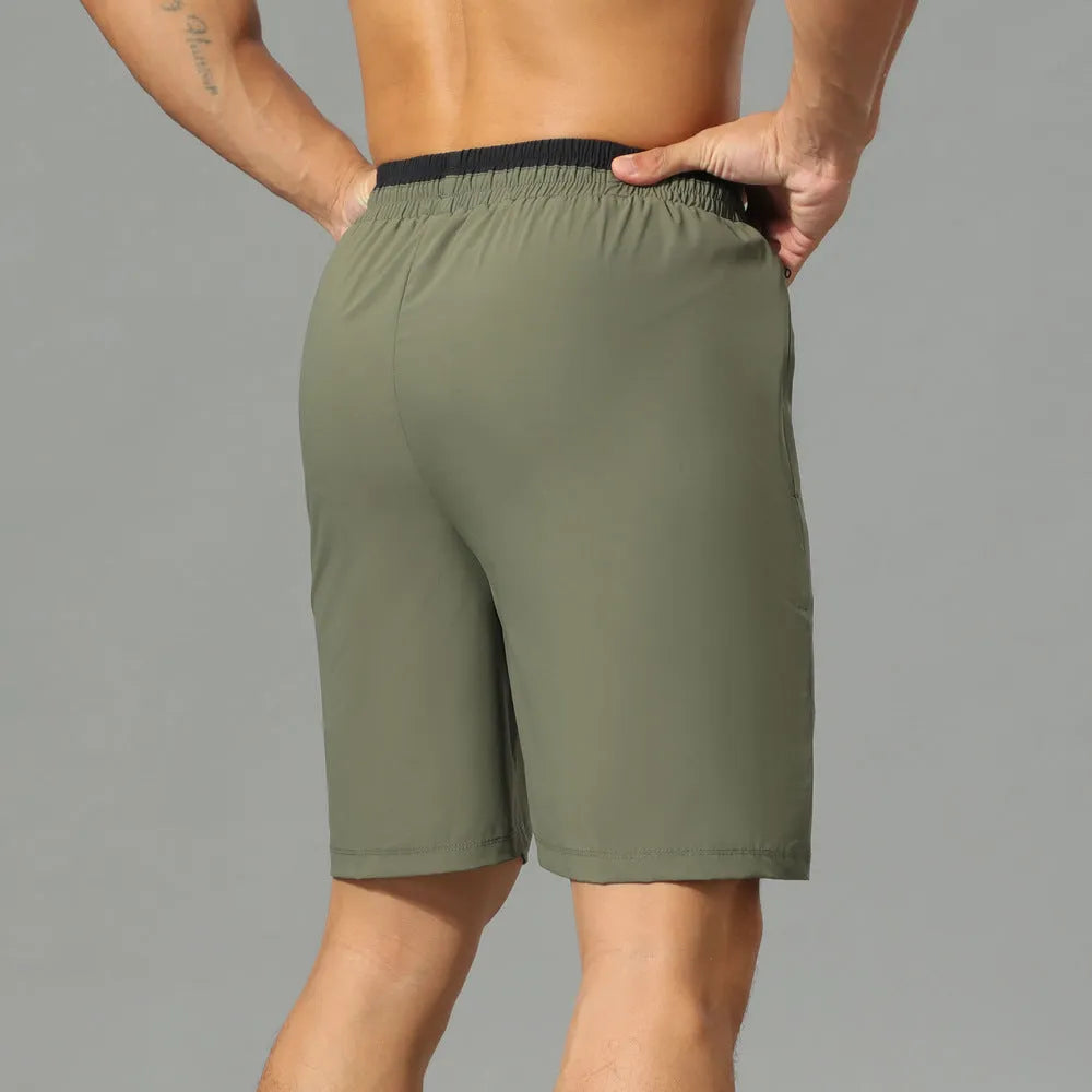 Men's grey Ice Silk quick-dry cropped workout pants showing loose athletic style and fifth-pants length