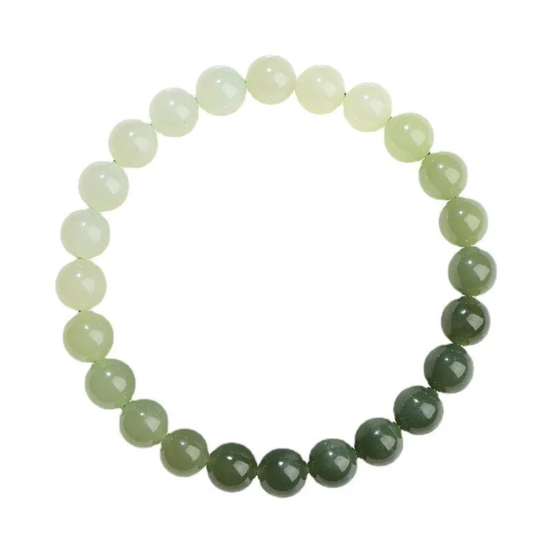 Natural clear water Hetian jade ball bracelet showing gradient jade beads in round or barrel shapes