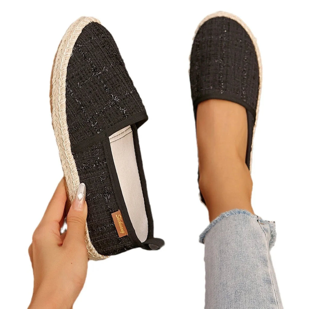Casual fisherman shoes with canvas upper and rope sole bottoms in black, white and beige colours