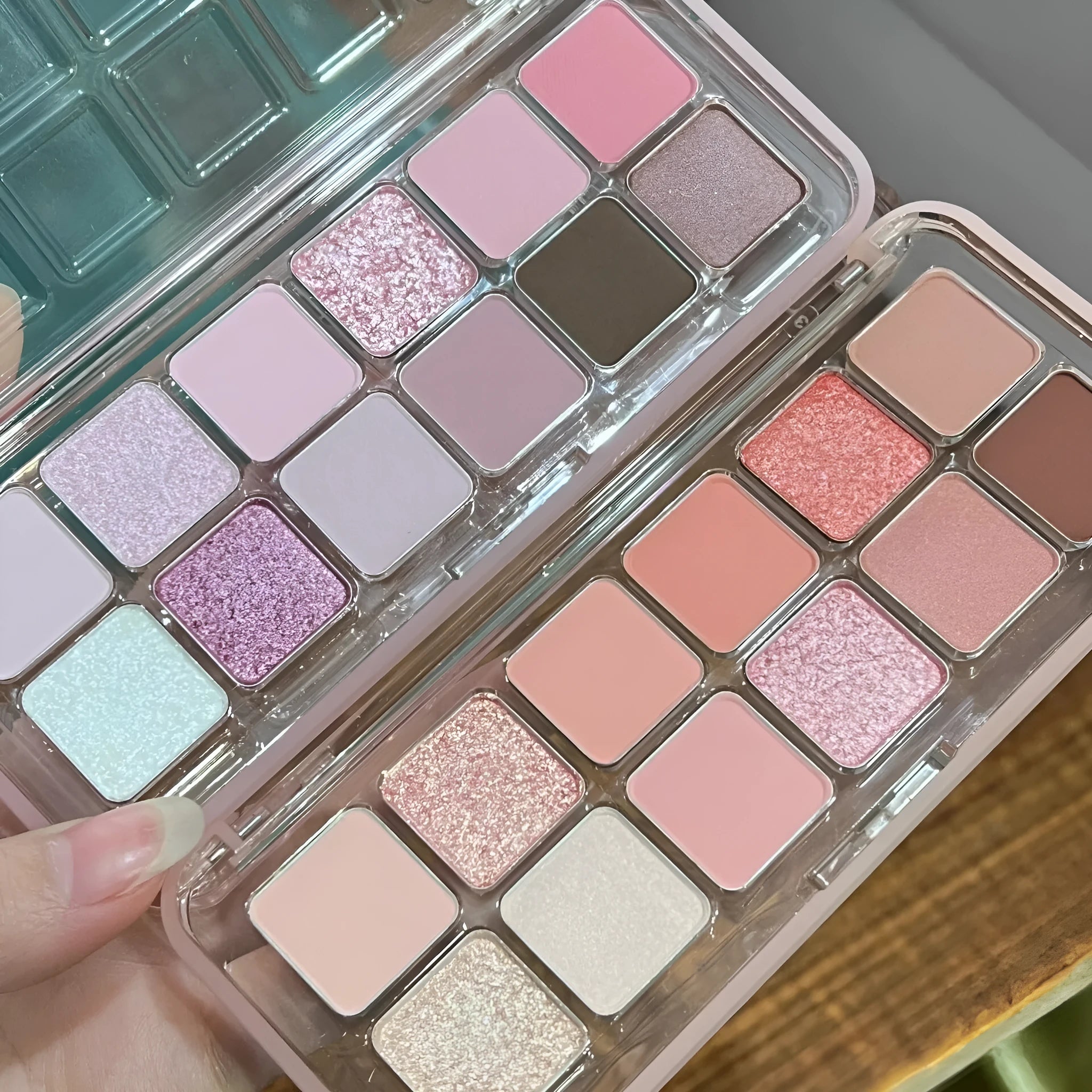 Creative Home eye shadow palette showing 12 colours including peach apple and cherry plum shades