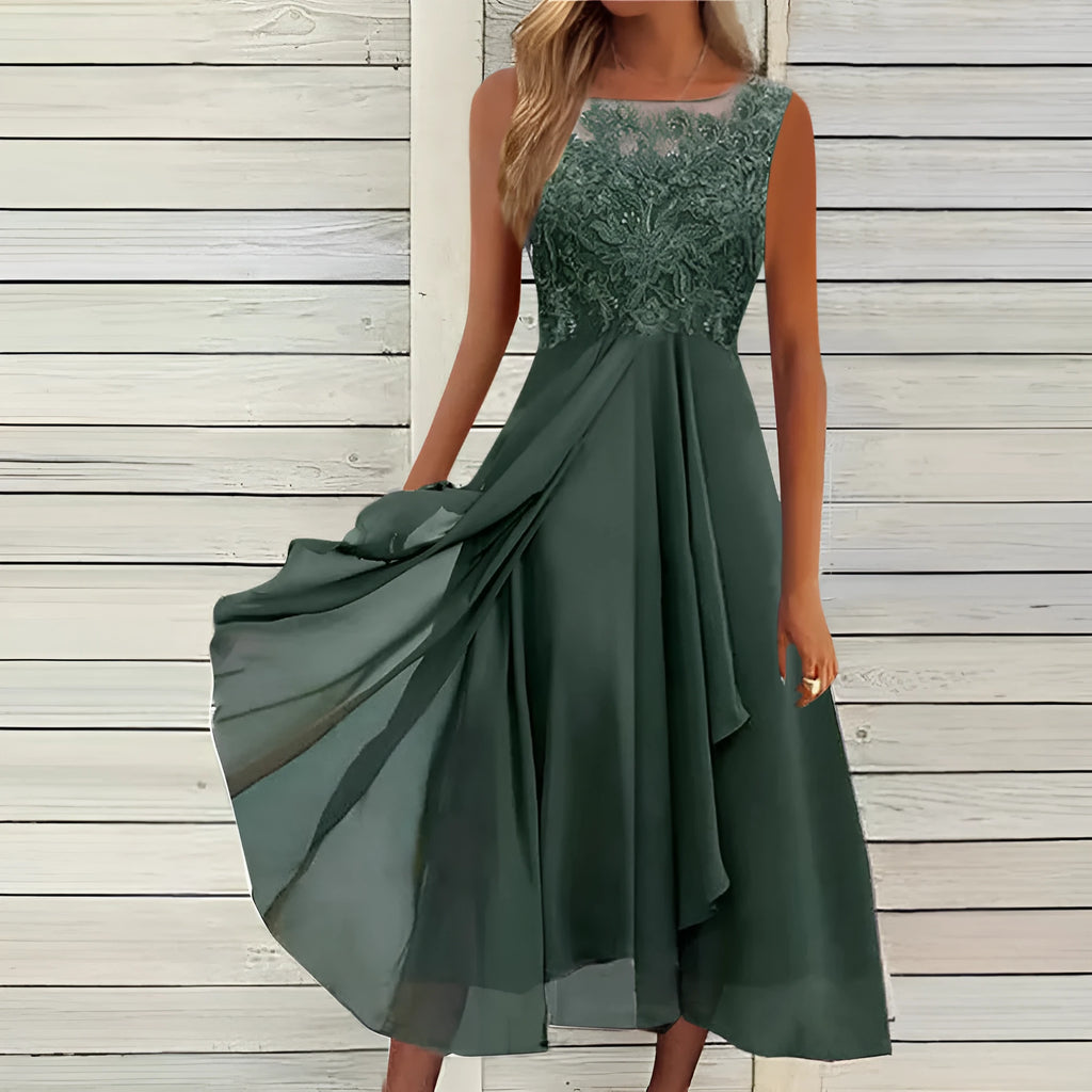 Women's sleeveless green chiffon dress with lace embroidery and a mid-length flowy skirt.