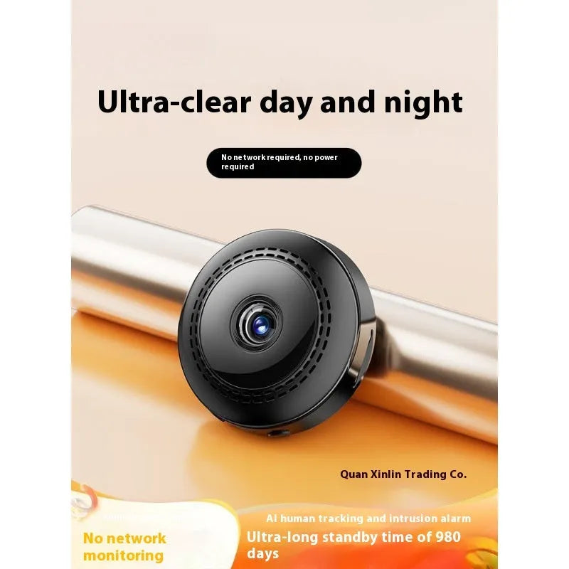 A compact, circular wireless wifi security camera with a 360-degree lens on a table.