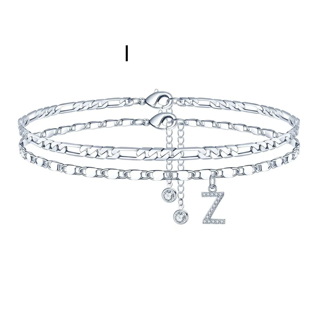 Silver-toned copper anklet with double-circle charm and bead, showing letter styling option