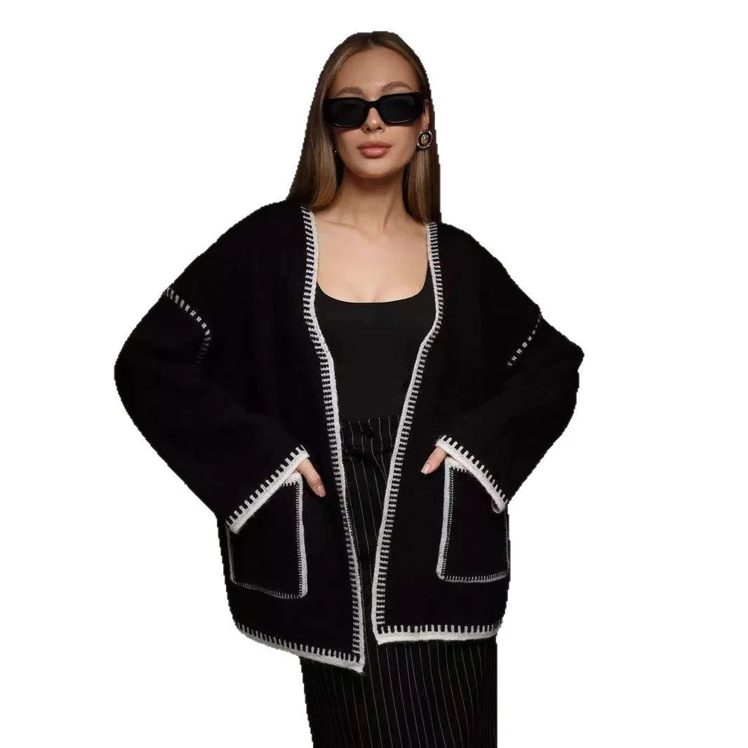 Loose lace-up knitted cardigan sweater coat in camel colour showing front detail