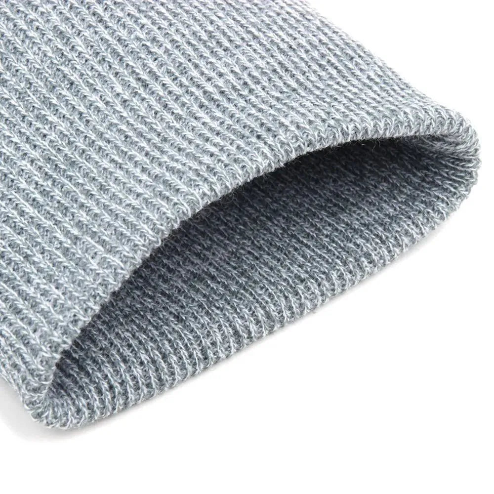 Unisex knitted acrylic beanie in army green on a white background, stretchy 55–60cm fit for outdoor winter use