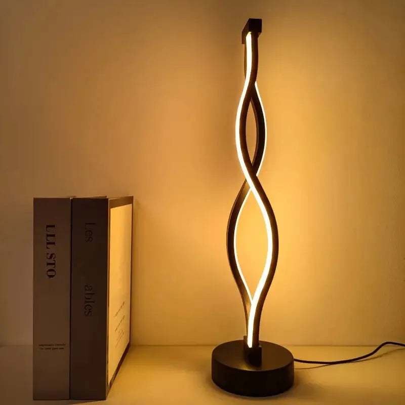 Black aluminium USB desk lamp with button control for three colour dimmable lighting.