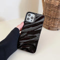 Wave pattern TPU phone case for iPhone 17 series in burgundy colour showing textured back design