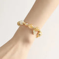 Gold coloured rutilated quartz crystal bracelet with Korean style design and electroplated finish