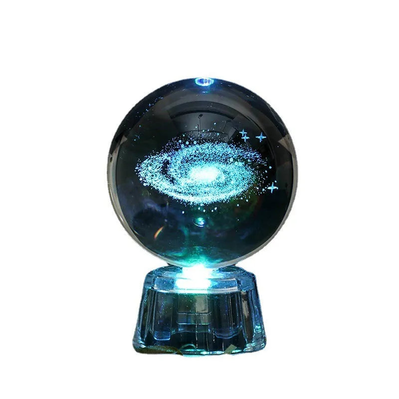 Transparent white crystal ball ornament with inner carving on a fixed base.