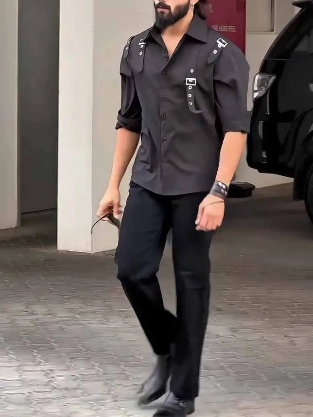 Men's black utility-style button-up shirt on a hanger, showing classic collar and button front.
