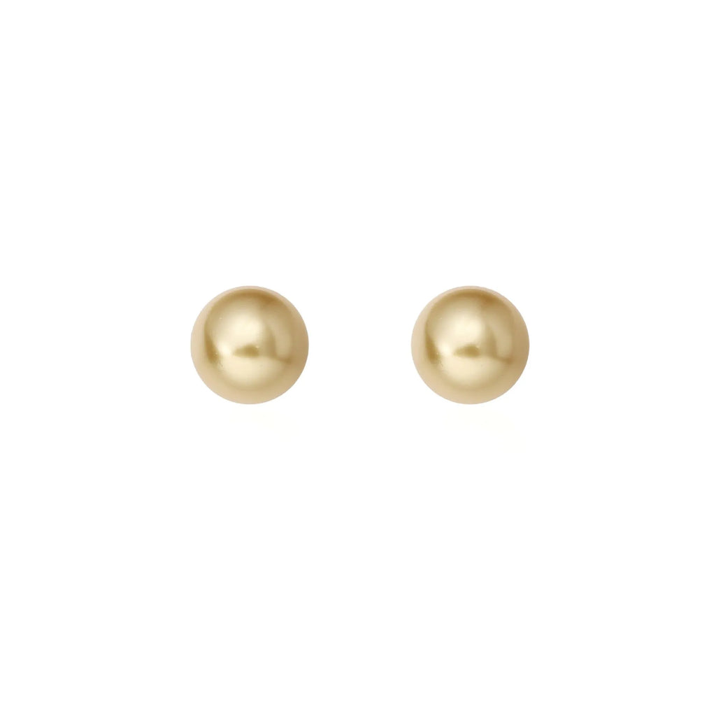 Large pearl stud earrings with geometric silver settings and eight-pointed star motifs