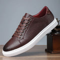 Men's black low-top business leather shoes with a rubber sole and stitching detail.